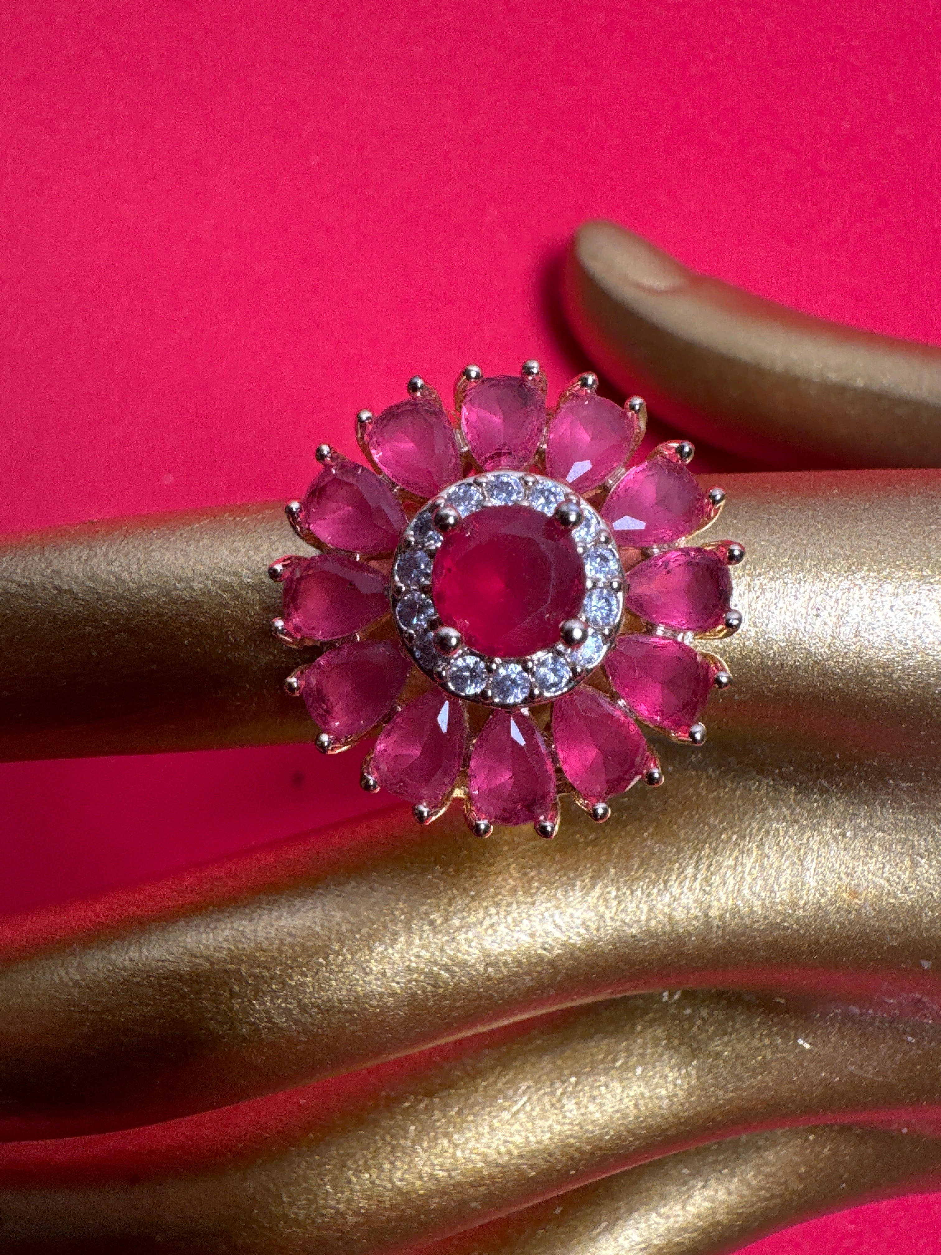 Gold ring with pink beads