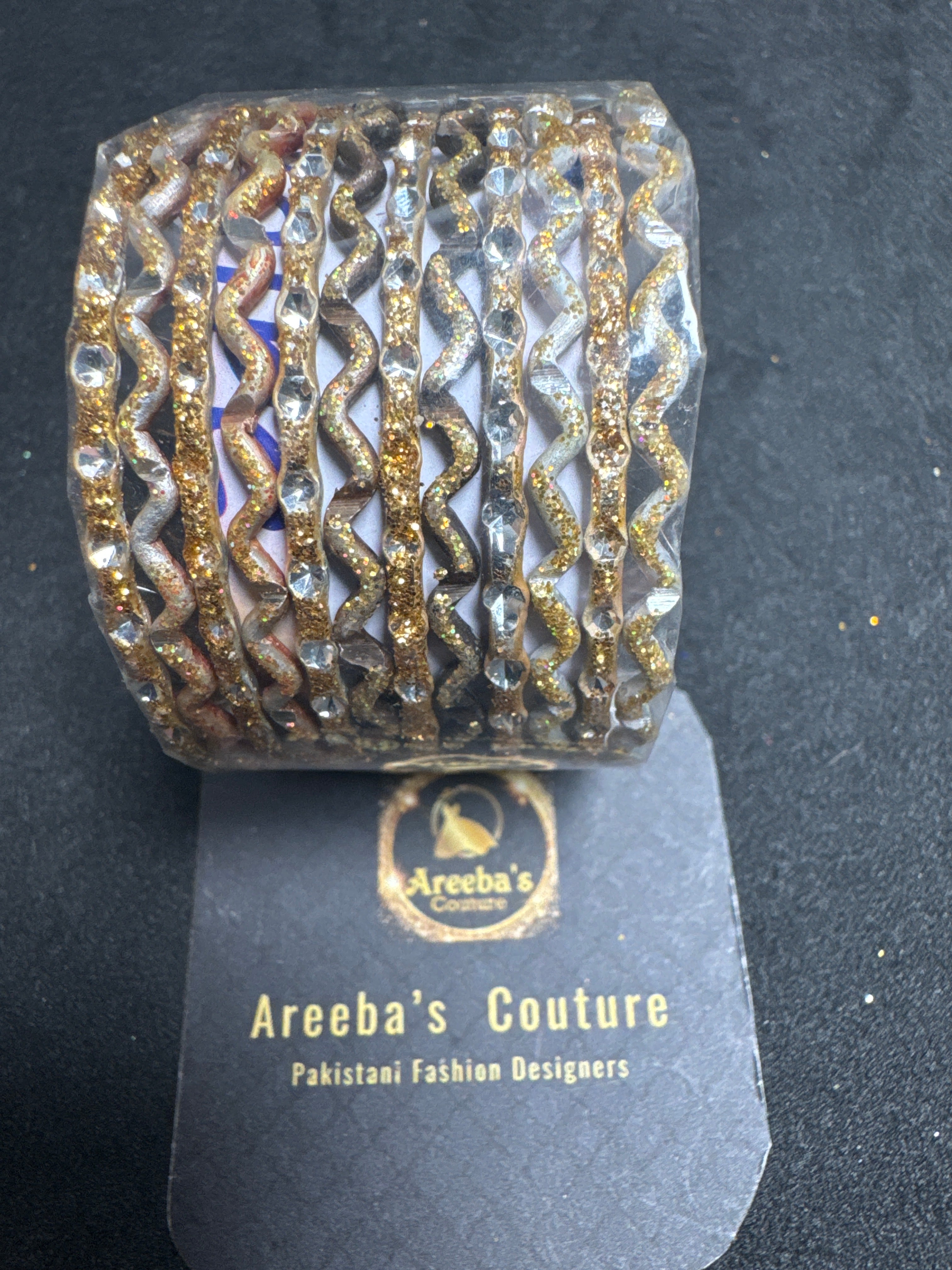 Girls light gold bangles A23