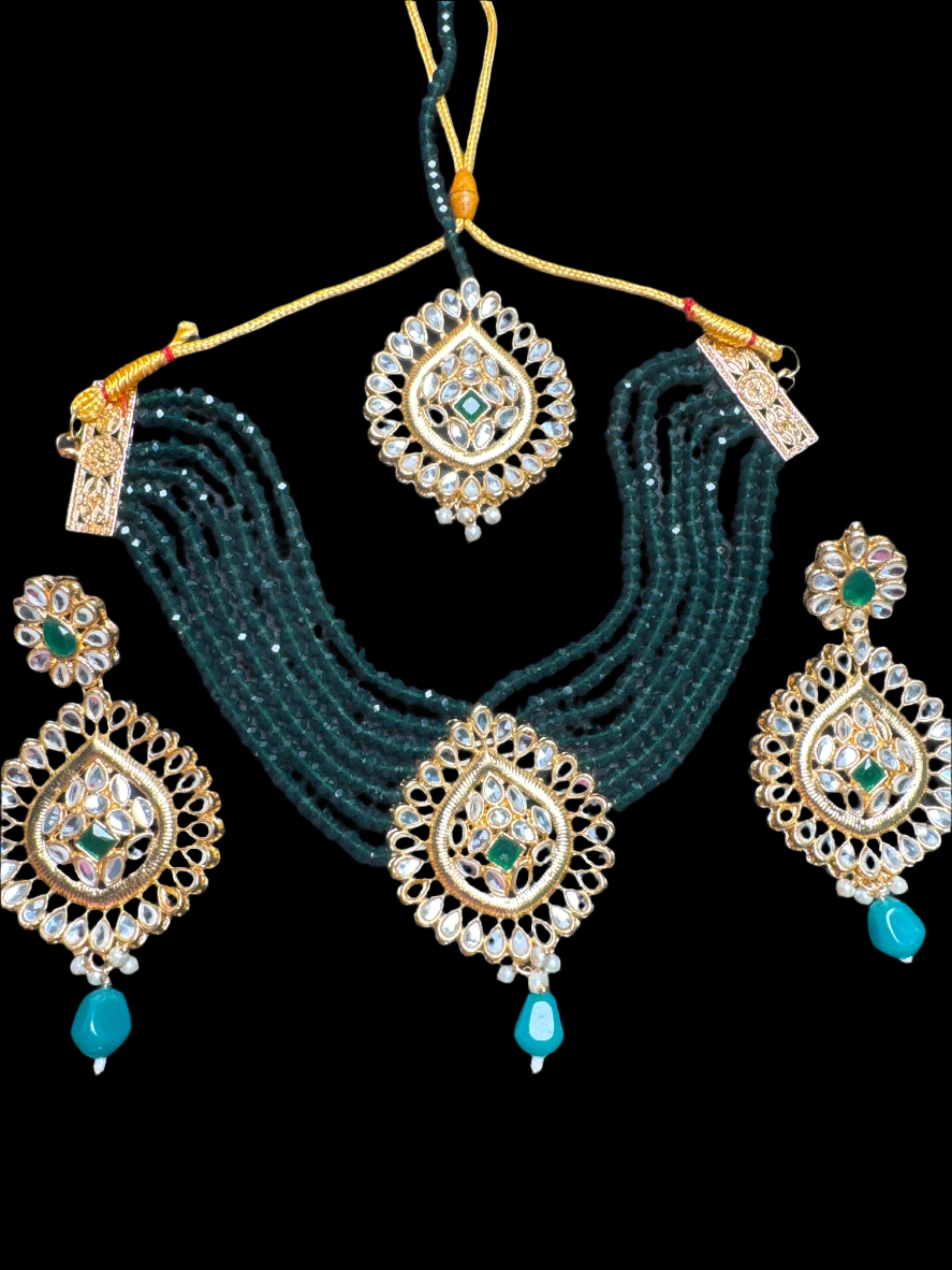 Gold colour Jewellery set with necklace, earrings and Teeka with Green & gold pearls -KS11
