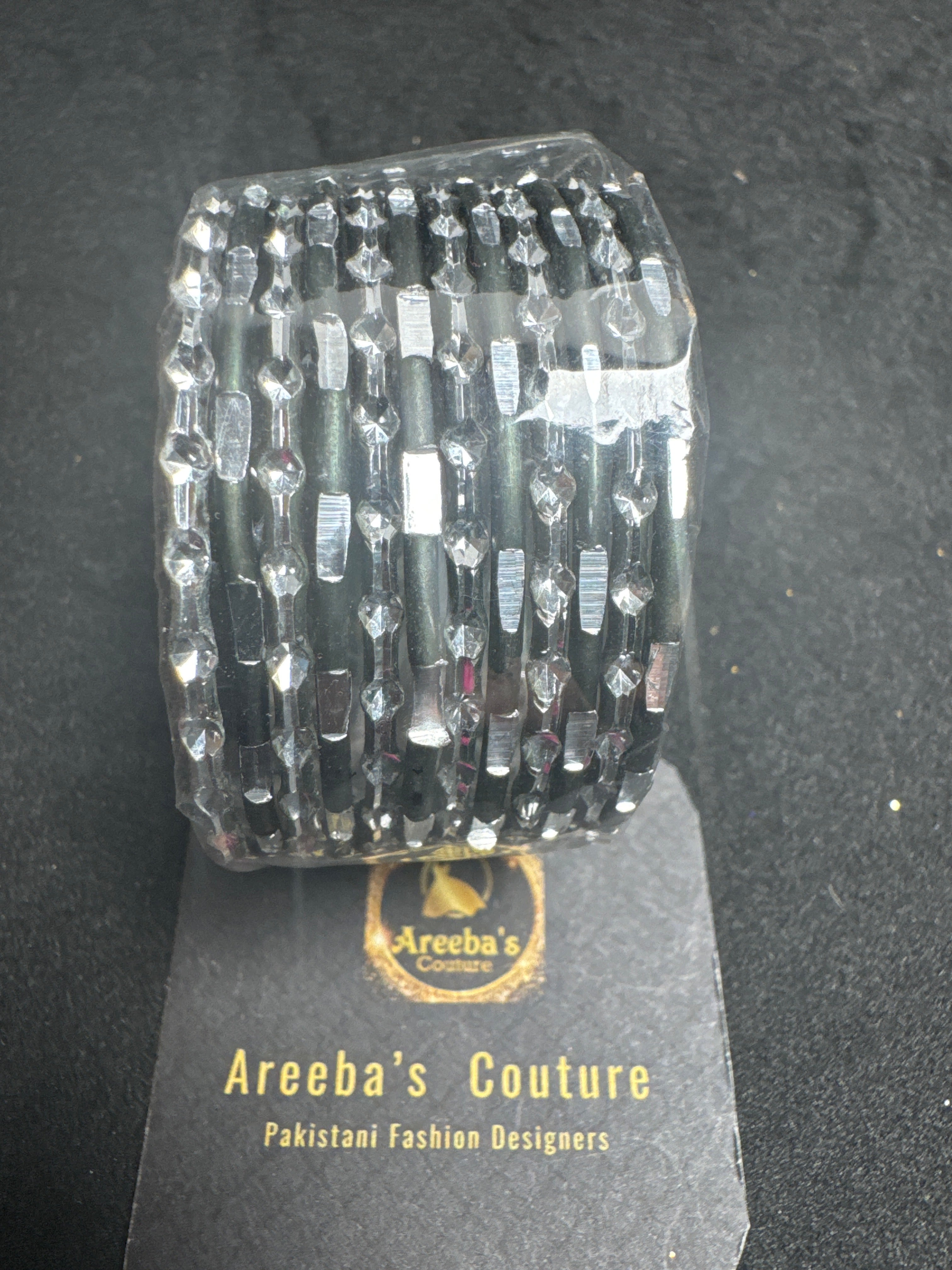 Girls black silver bangles A19