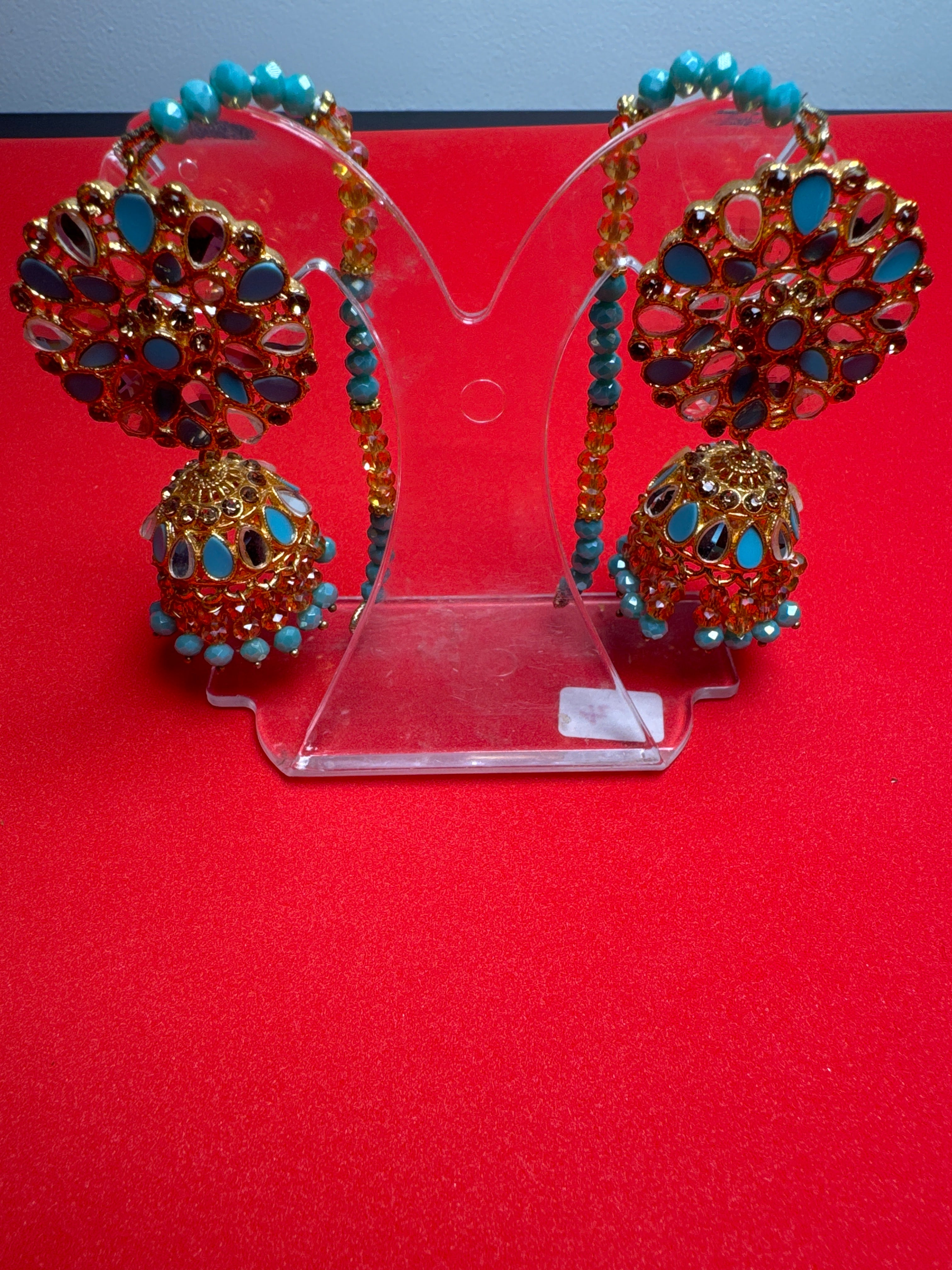 Jumkay  (Earings) in gold colour with ferozi pearls - TBE 12