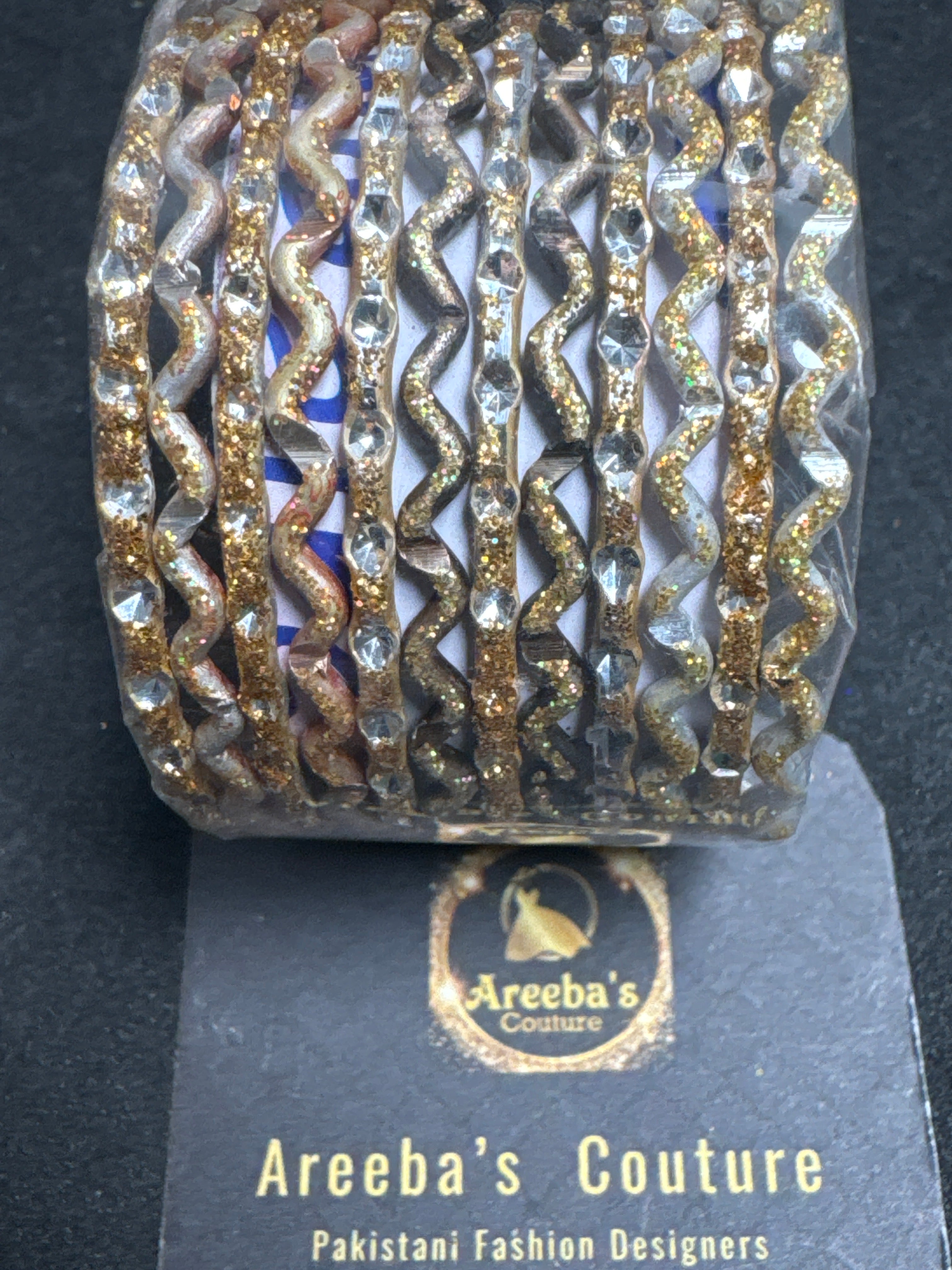 Girls light gold bangles A23