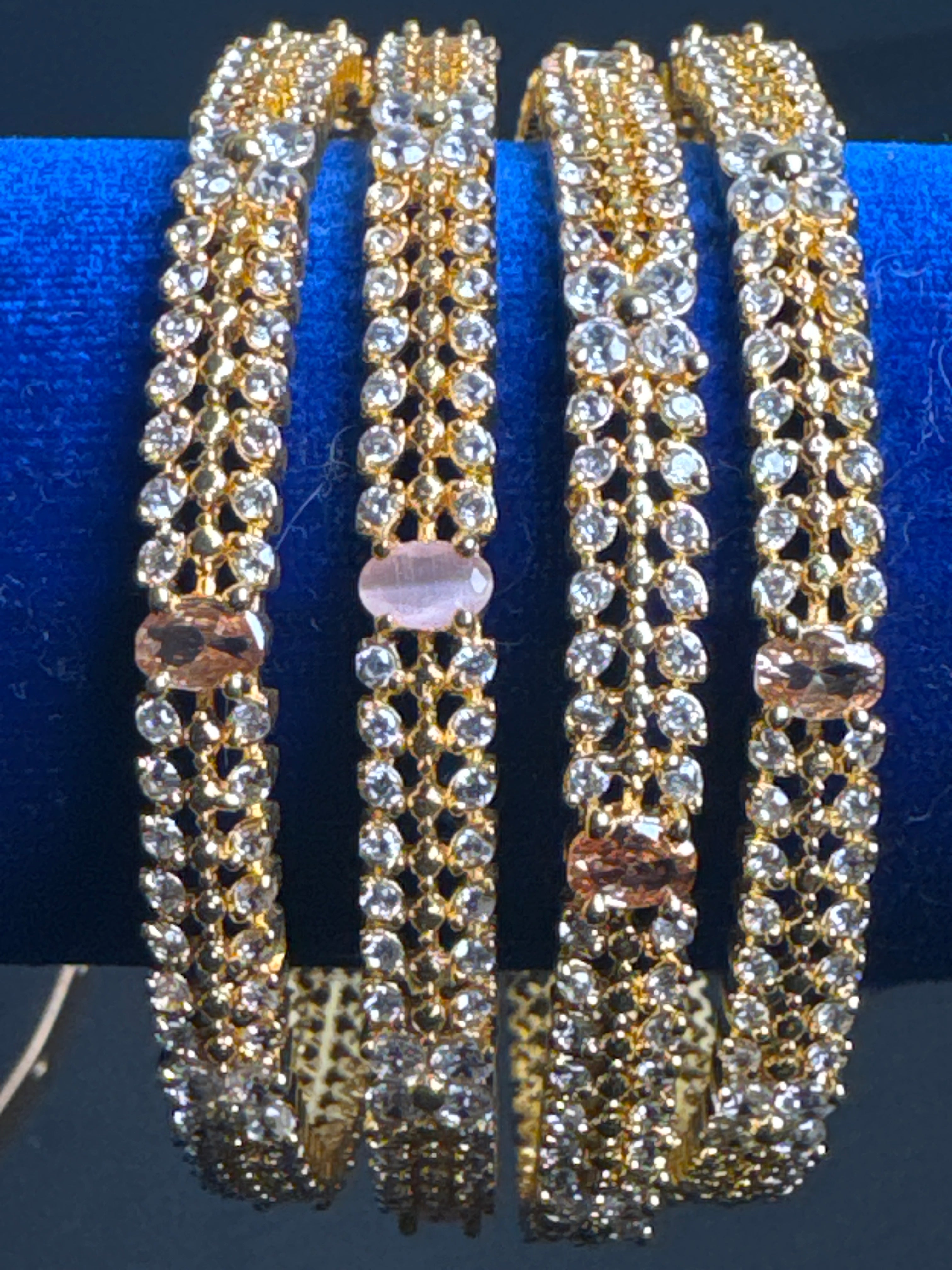 Golden colour bangles set of 4 bangles with pink pearls