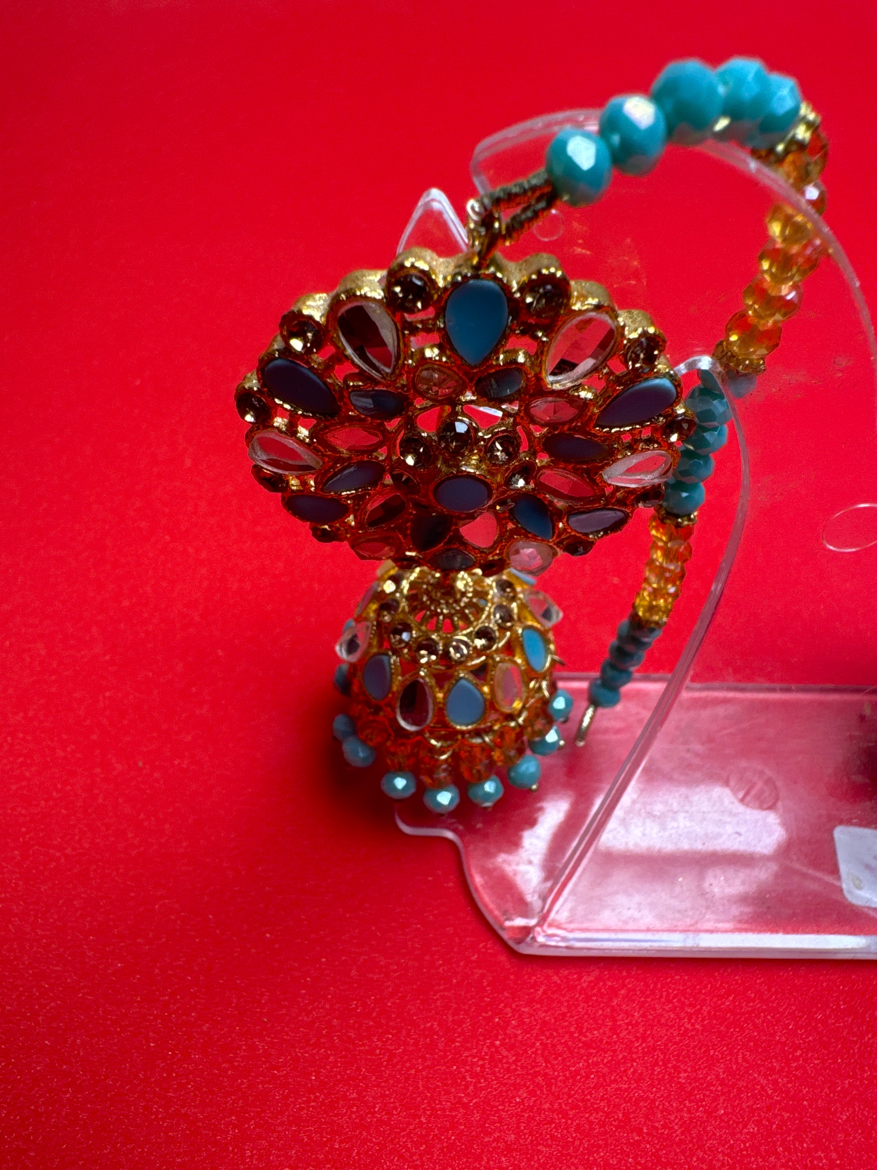 Jumkay  (Earings) in gold colour with ferozi pearls - TBE 12