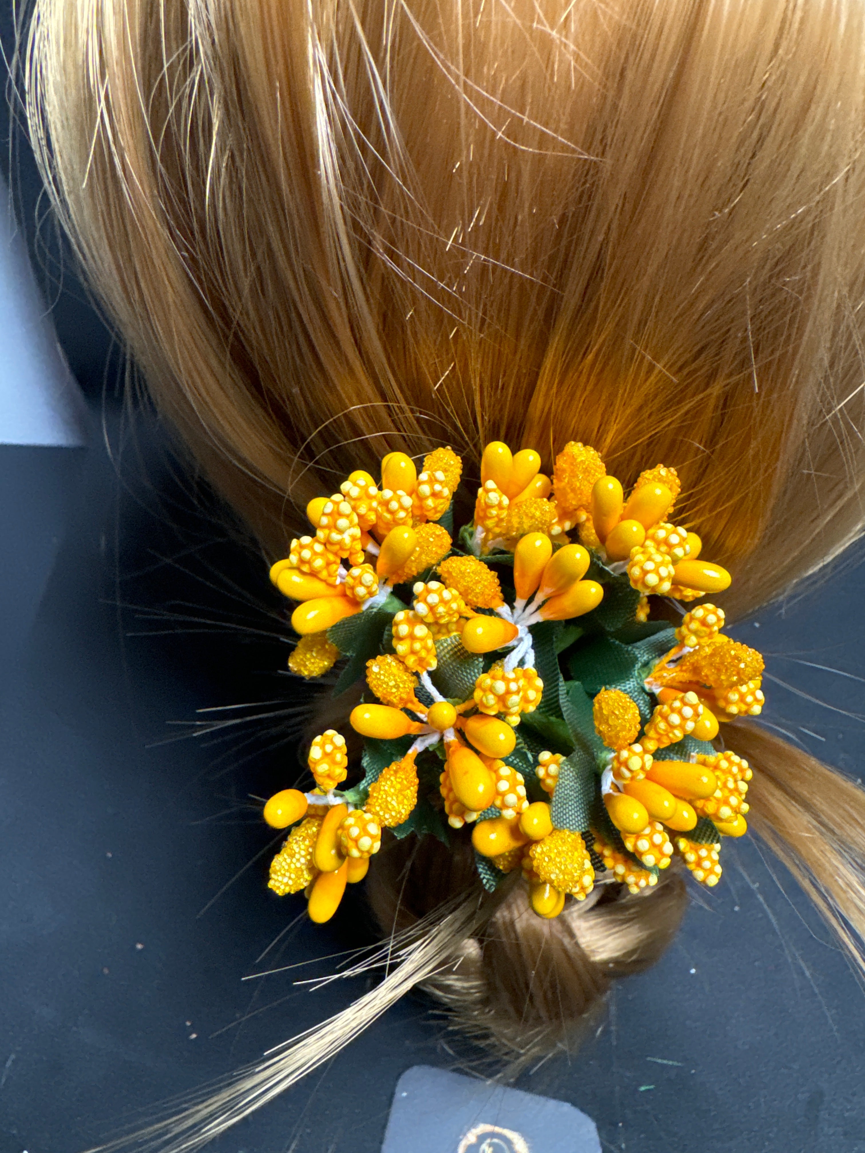 Flower hair pin in yellow