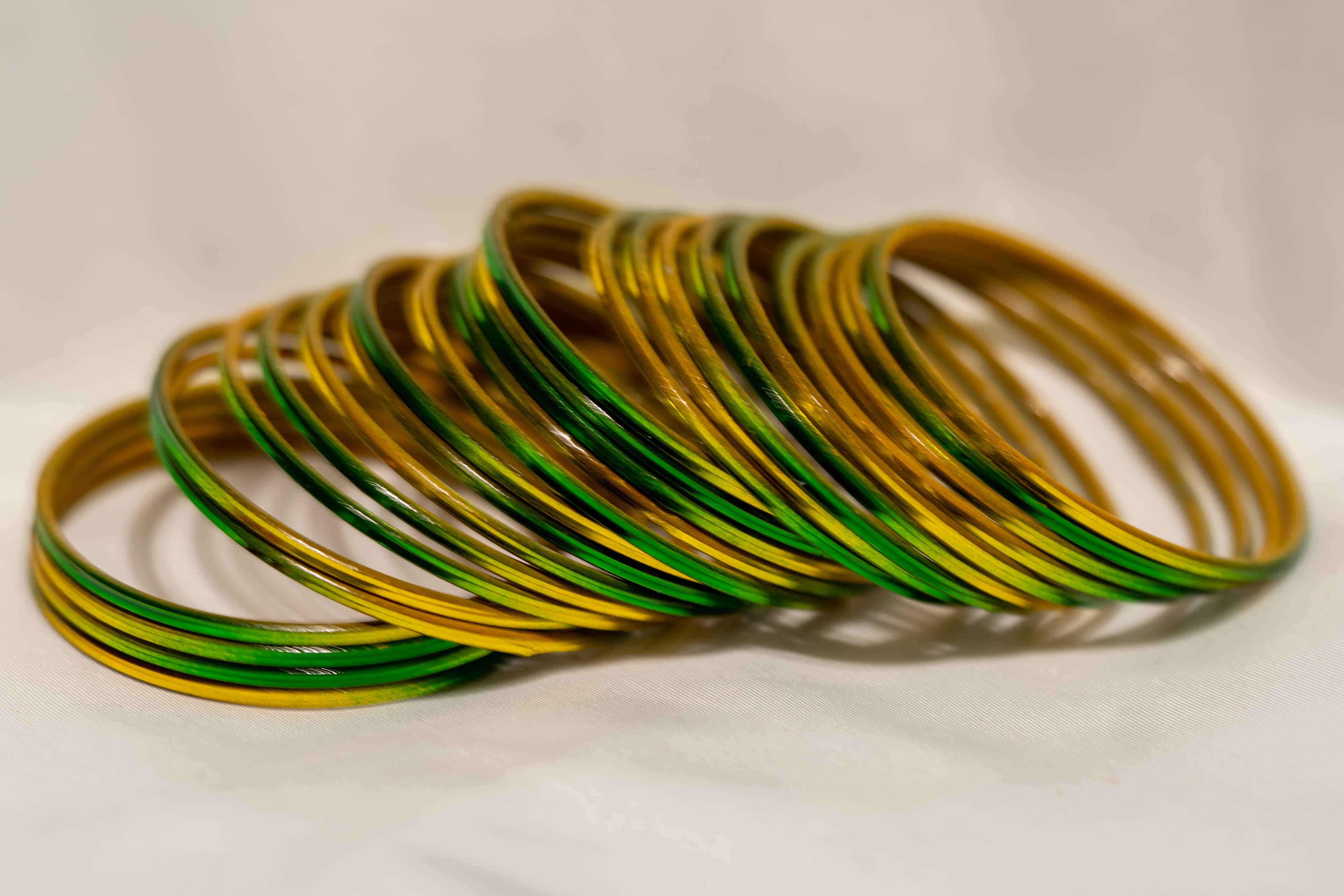 Handcrafted Bangles Green and Yellow Vibrant Colors Unique Designs Perfect for Weddings and Formal Occasions