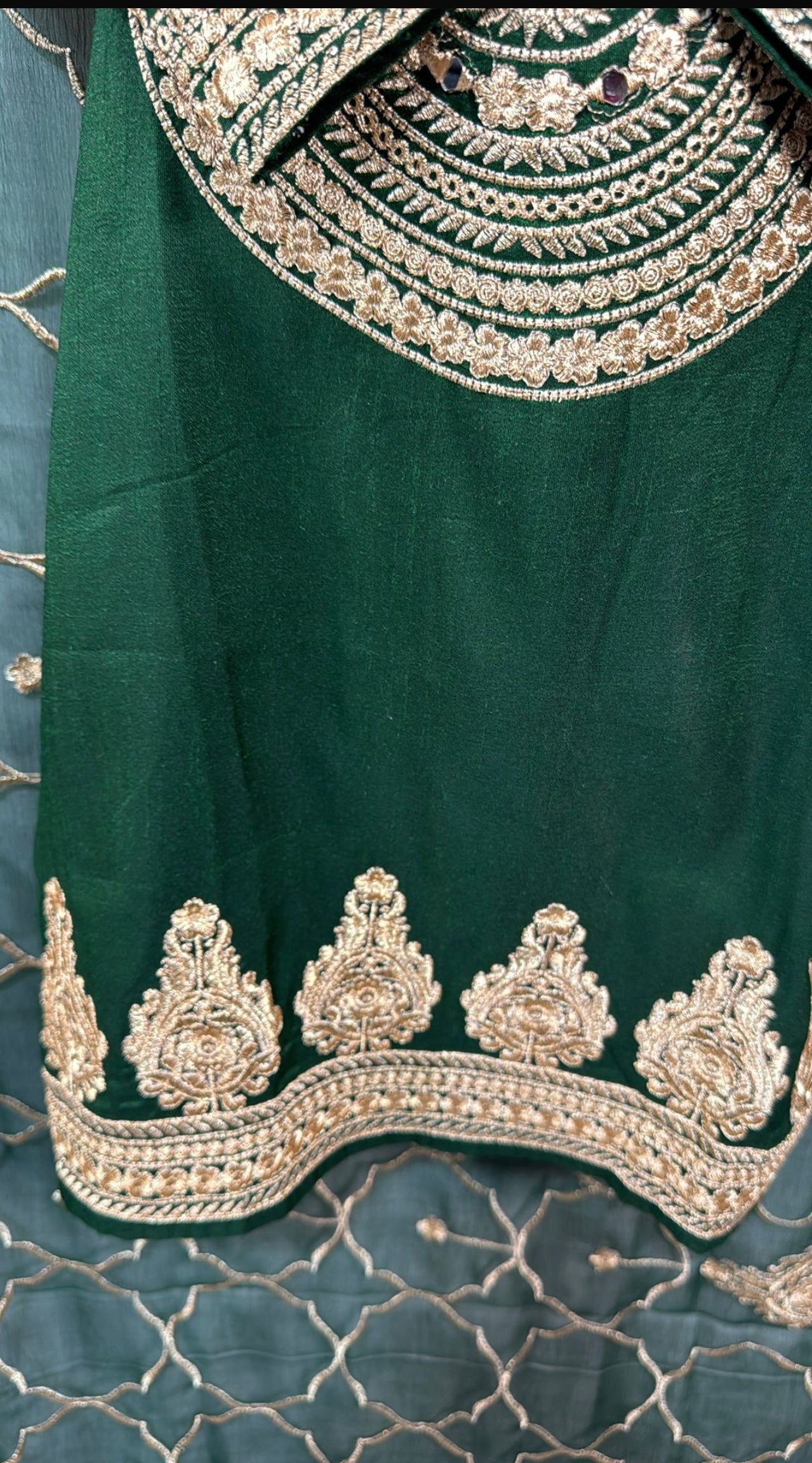 Three piece bottle green suit - heavily embroidered on shirt's damin, neck and slvees. Perfect for any occasion