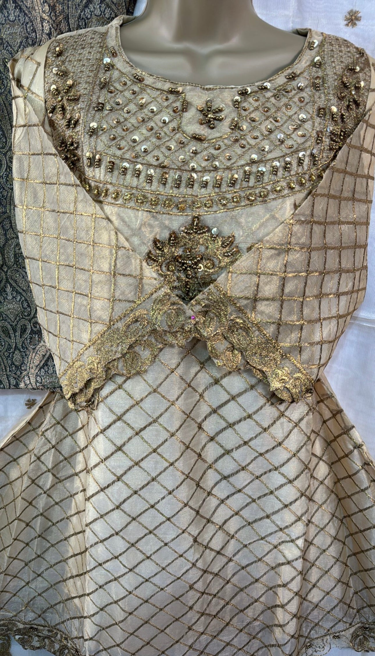 Gold three piece frock style suit