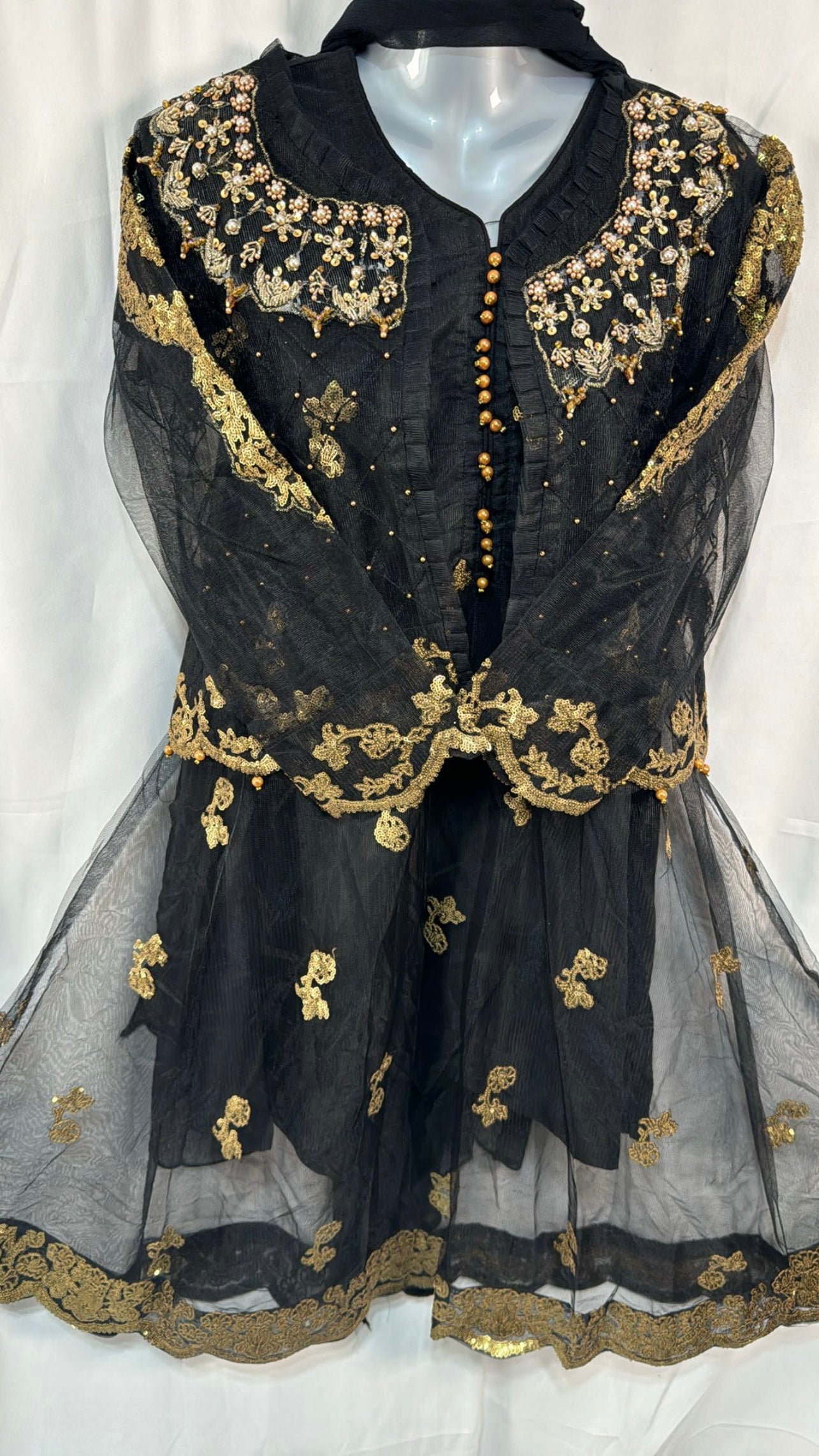 Black three piece frock style suit