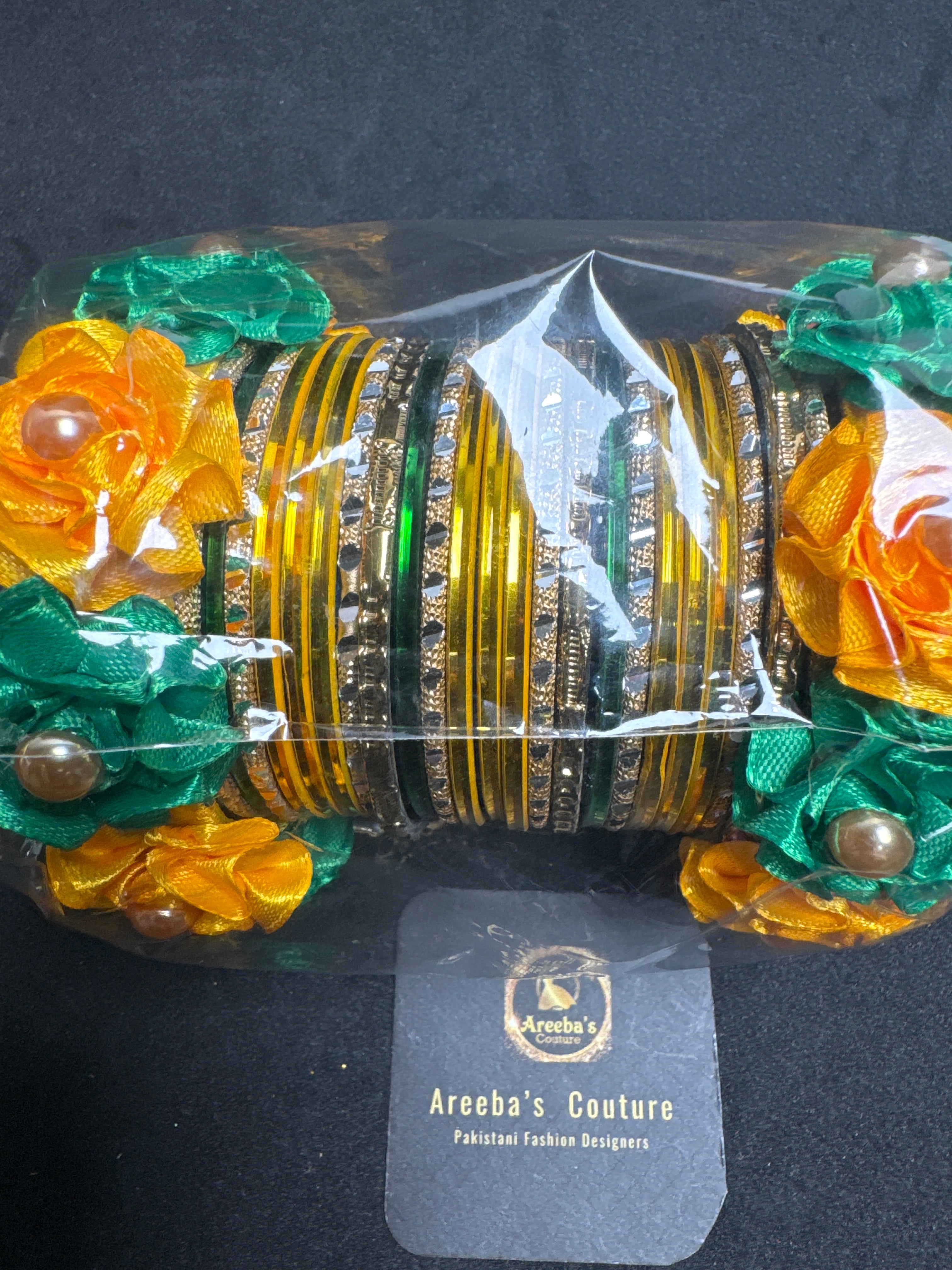 Yellow and green metal bangles with flower Kara