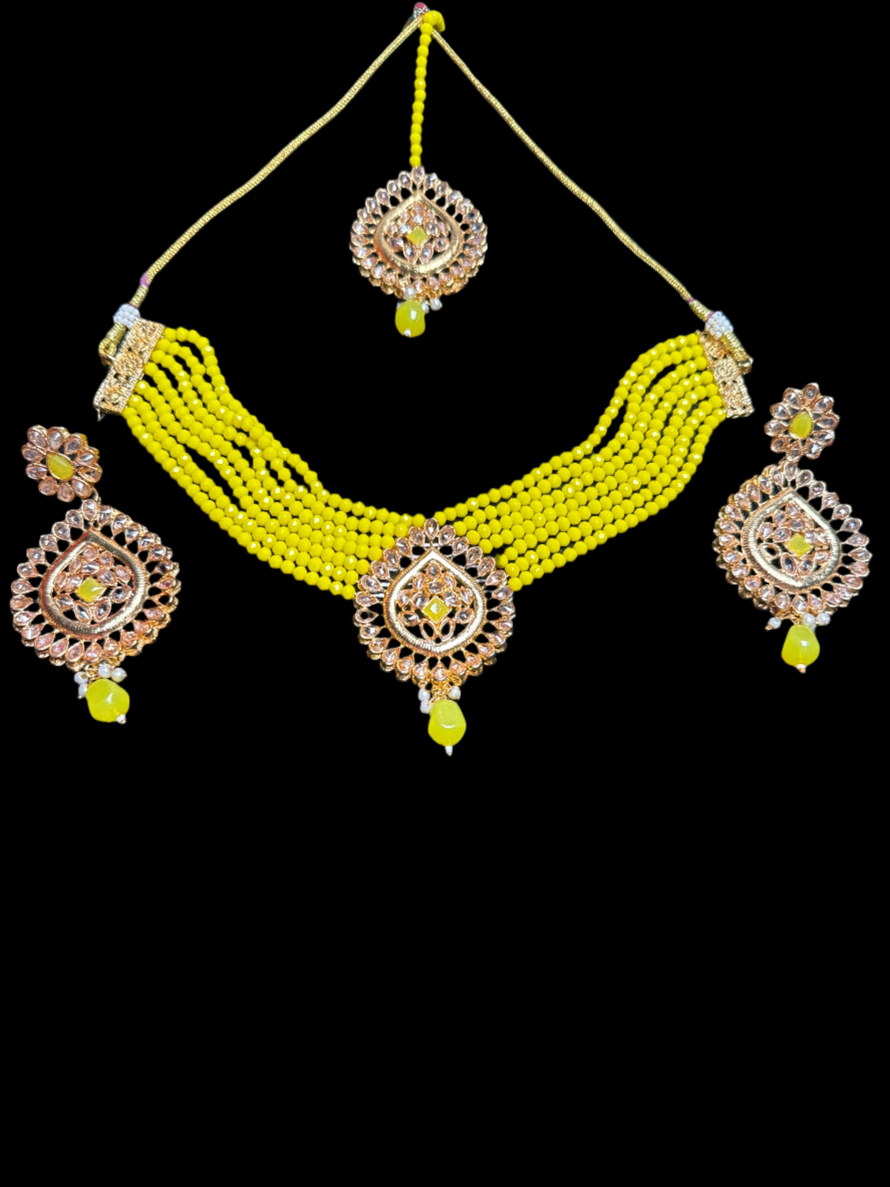 Gold colour Jewellery set with necklace, earrings and Teeka with yellow & white pearls  - KS13