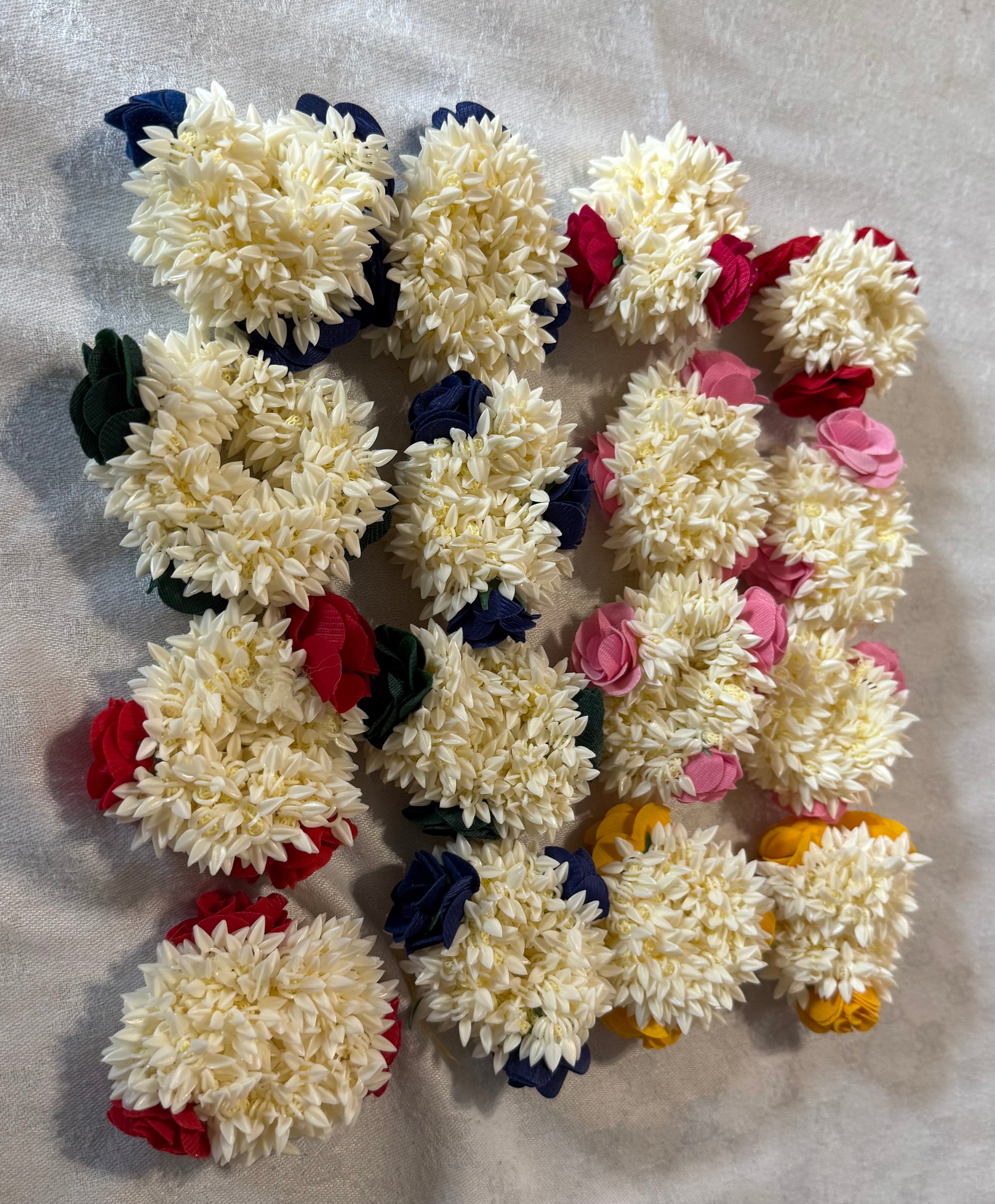Pack of Artificial floweral gajras  multicolour for use on Mehndi/Halidi occasions or casual use - Pack of 12