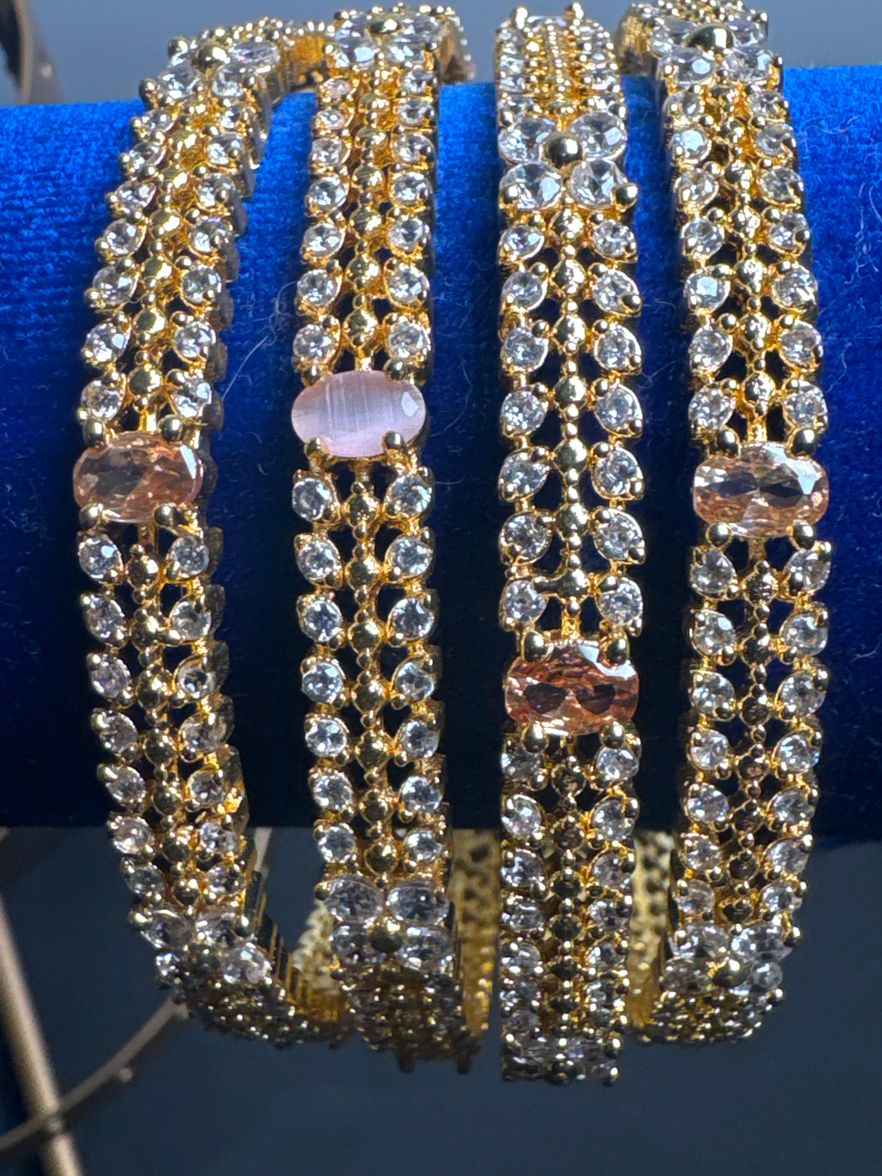 Golden colour bangles  set of 4 bangles with pink pearls