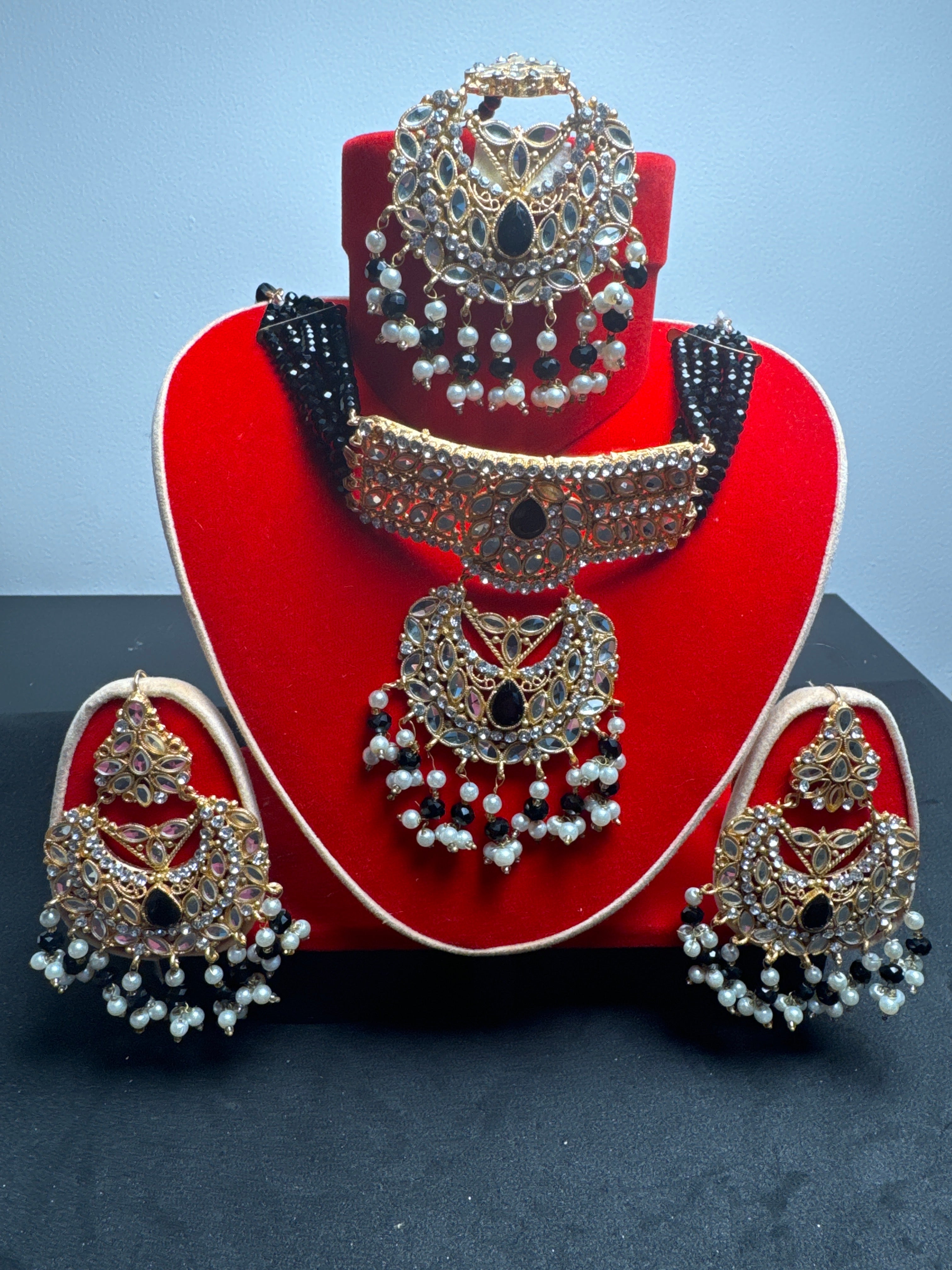 Gold colour Jewellery set with necklace,  earrings and Teeka  with black  & white  pearls  -KS5