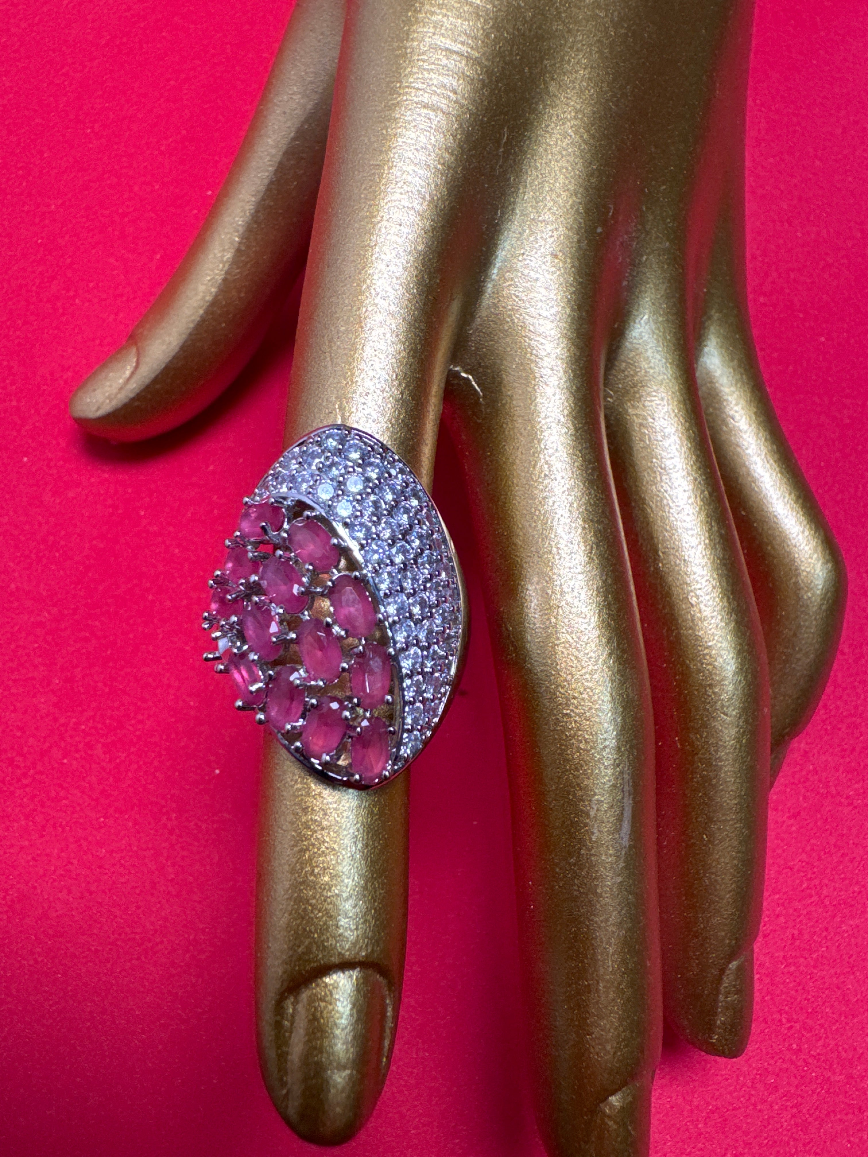 Silver ring with pink gems