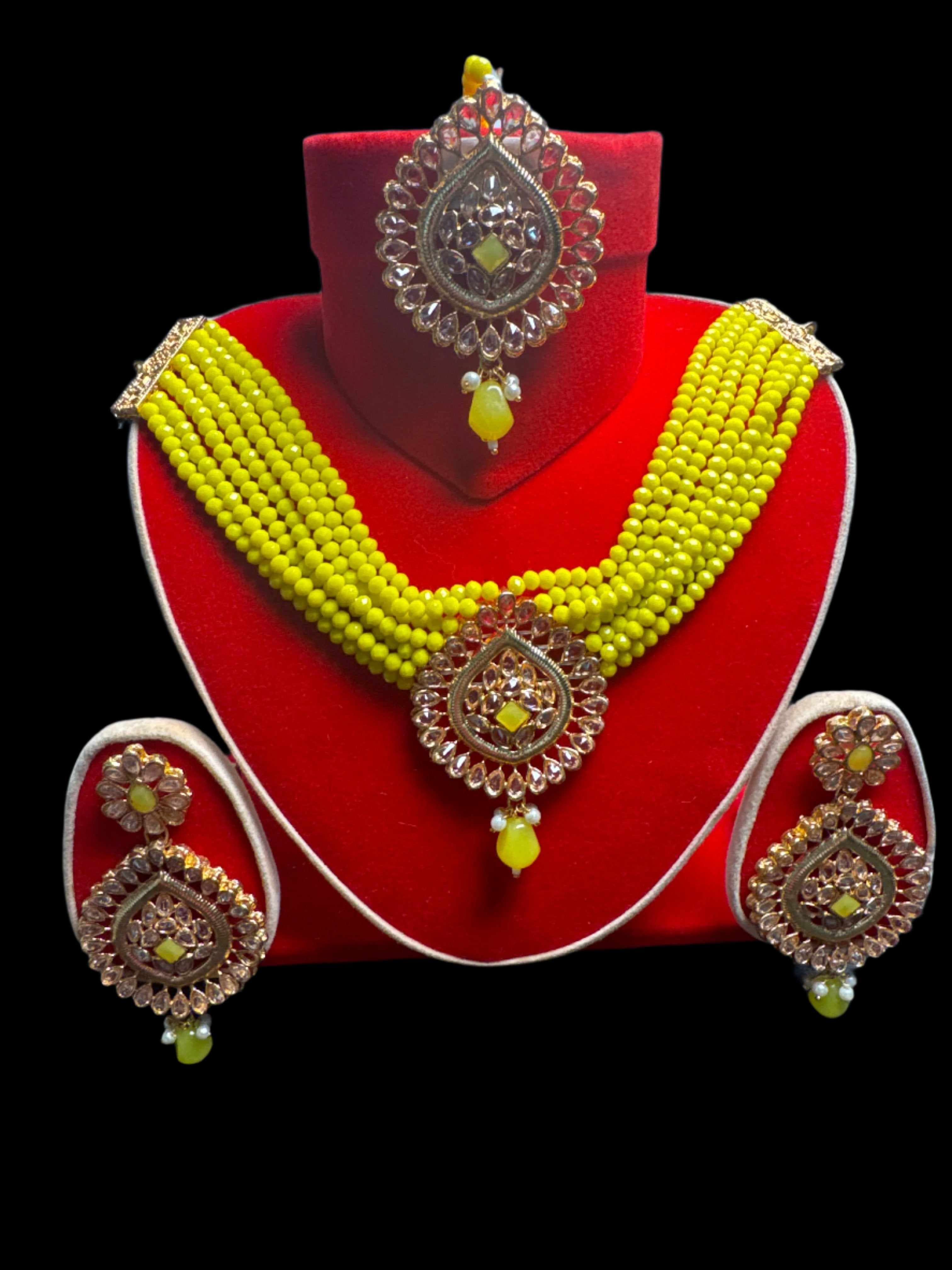 Gold colour Jewellery set with necklace, earrings and Teeka with yellow & white pearls  - KS13