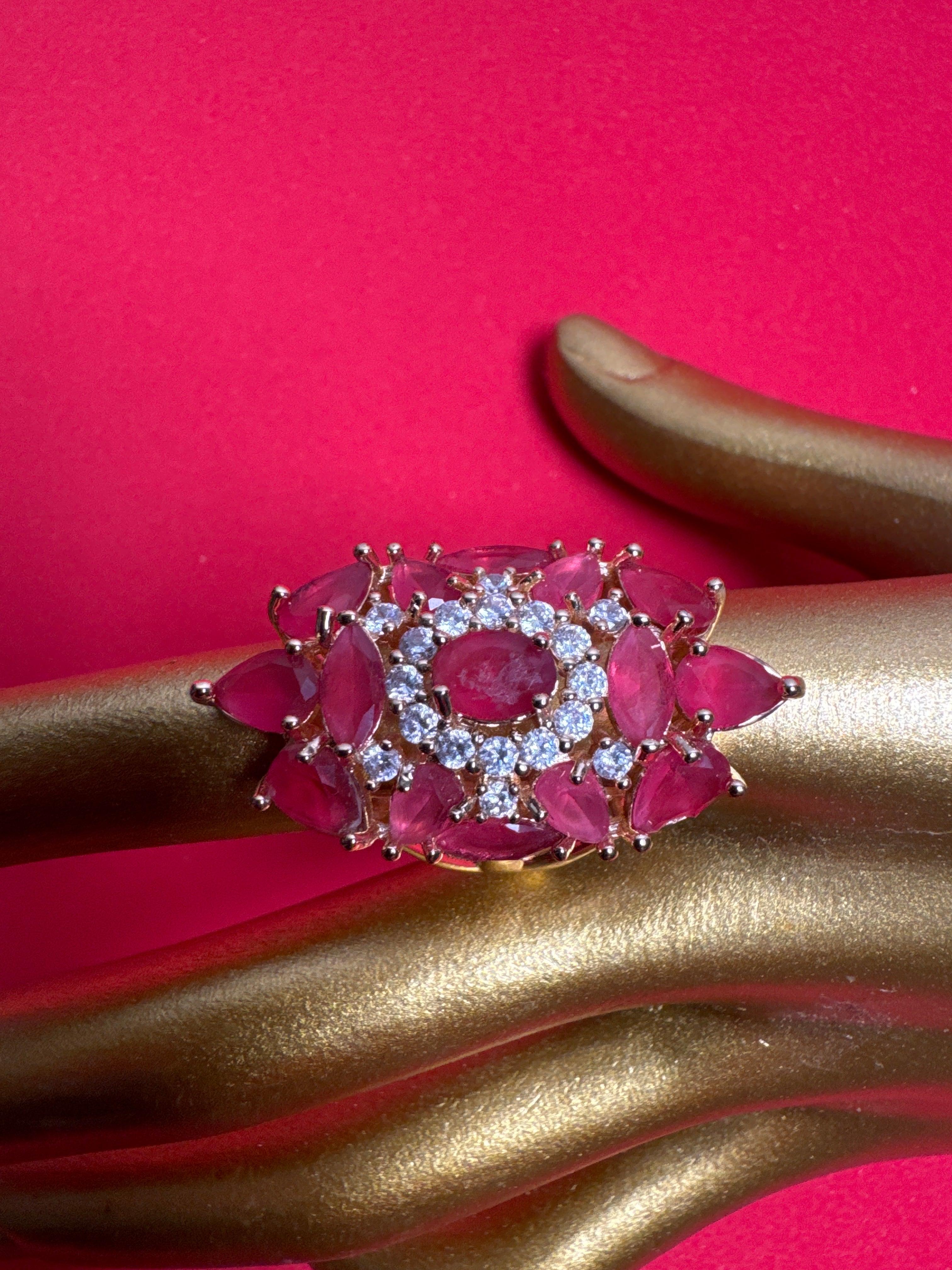 Gold ring with pink beads