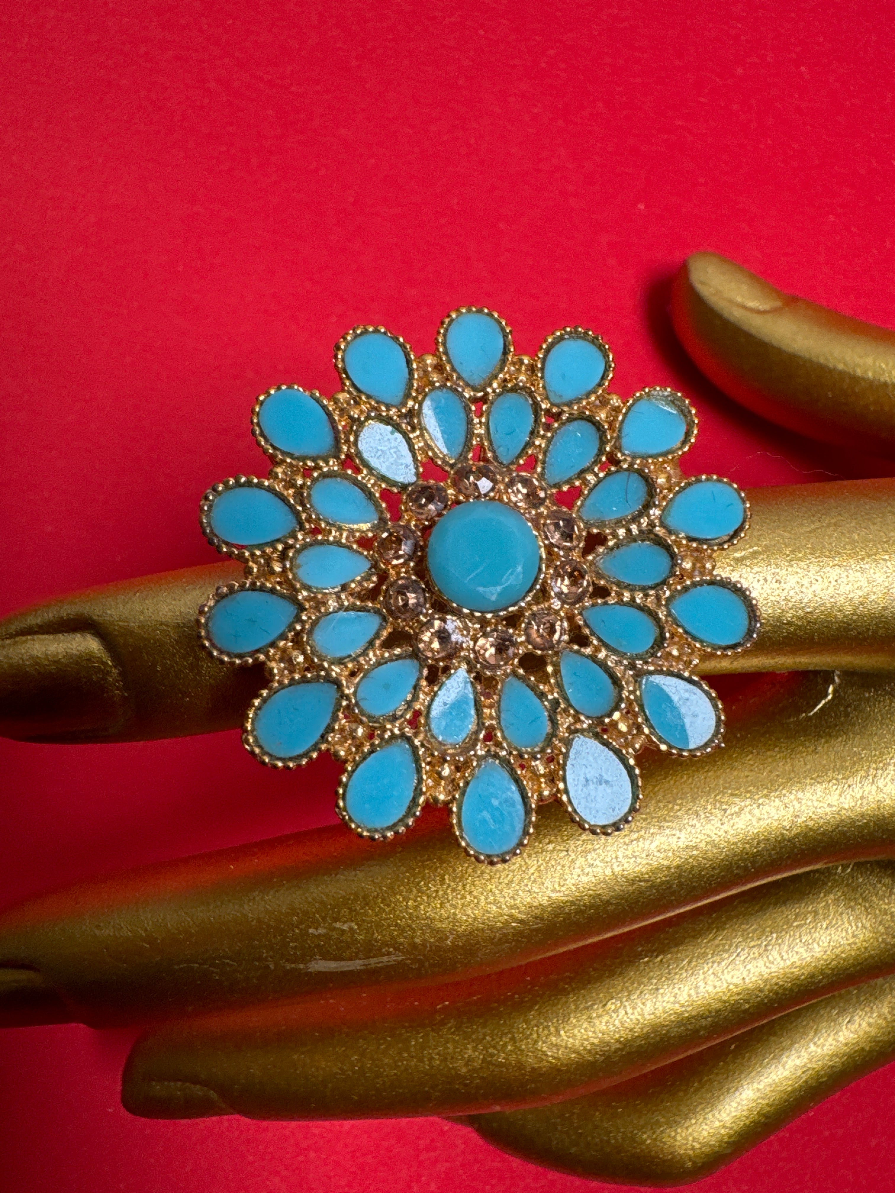 Gold ring with aqua beads