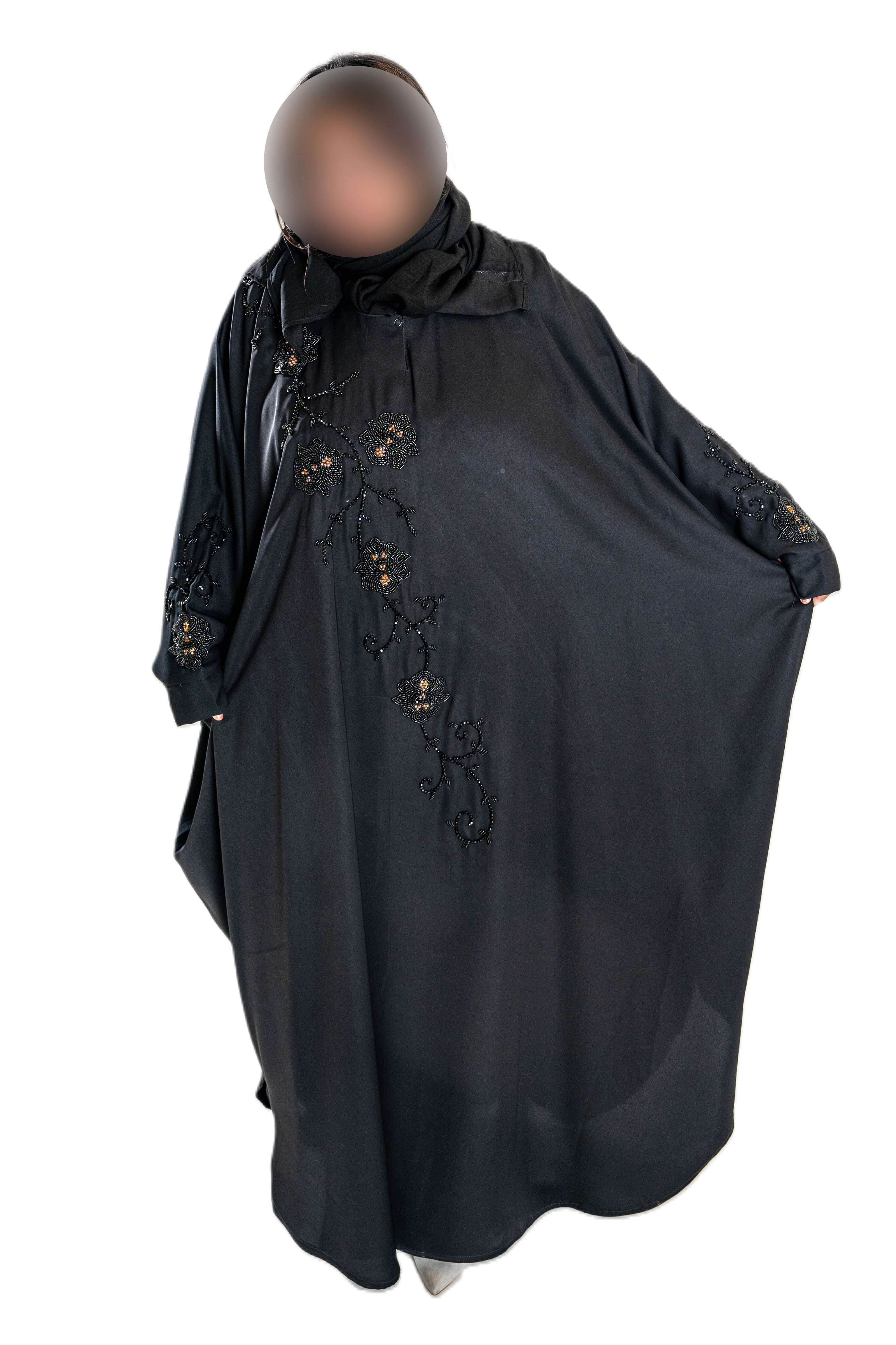 Embroidered and rose gold pearls on black abaya