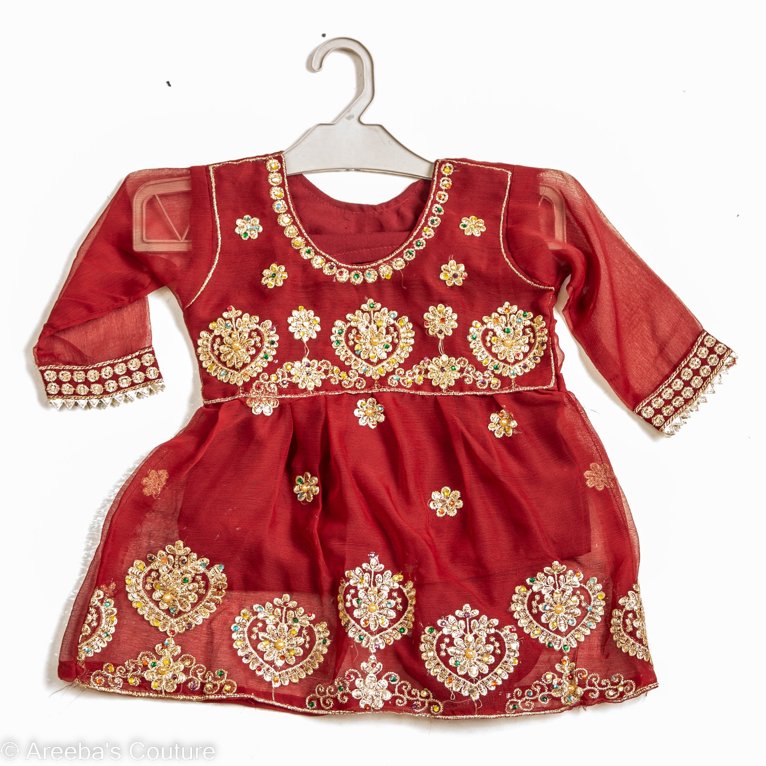 red chiffon frock with embellishments