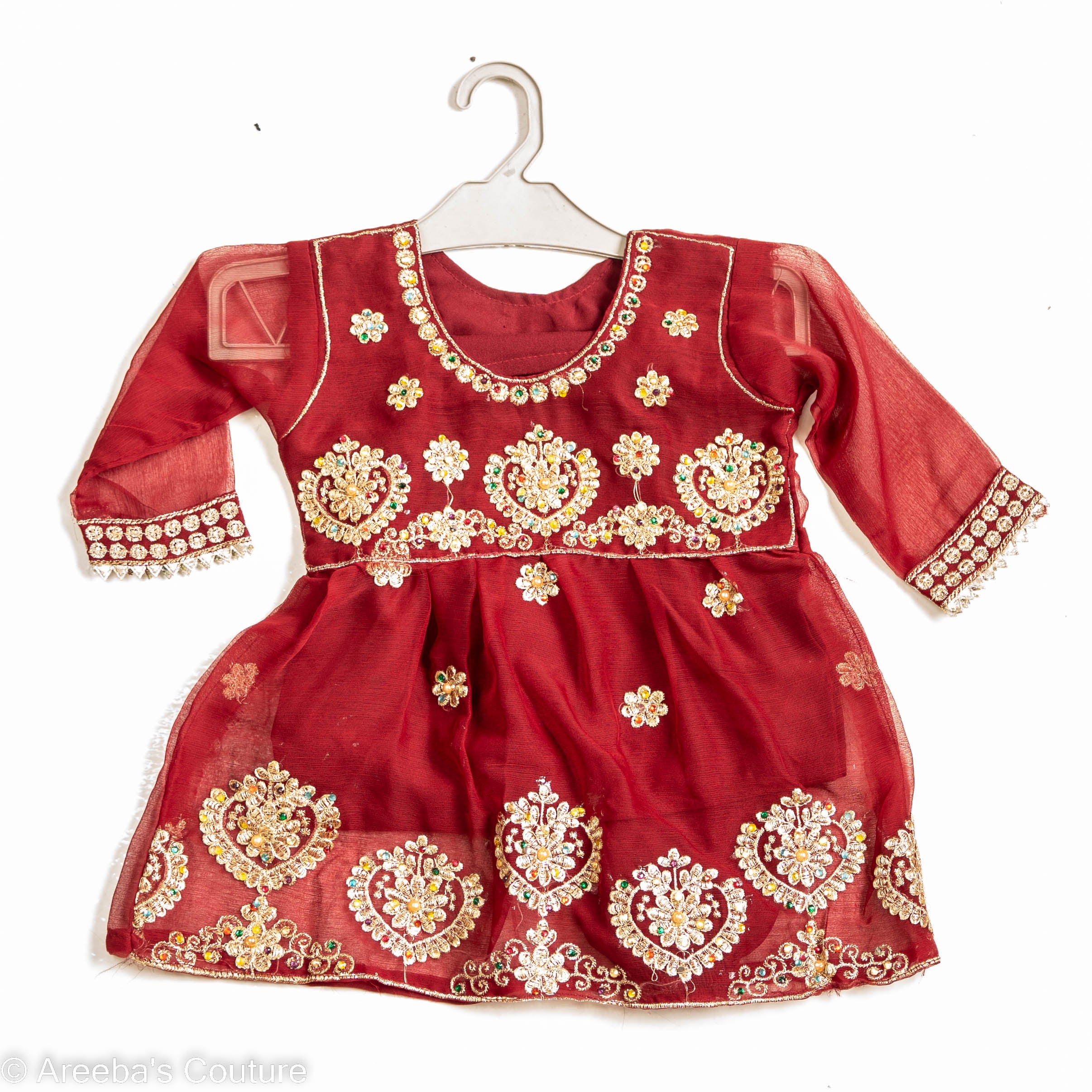 red chiffon frock with embellishments